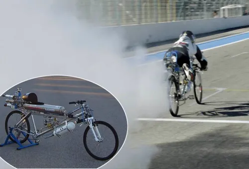 Cyclist on rocket-powered bike hit 207mph in less than 5 seconds to smash world record...