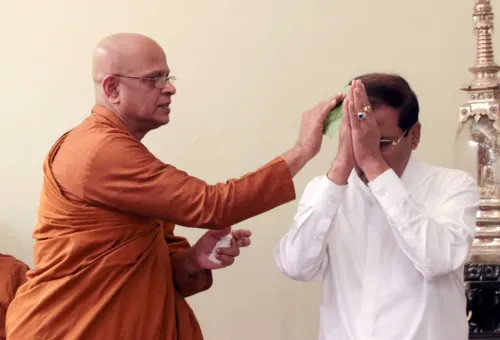 President attends Oil Anointing Ceremony at London Buddhist Vihara