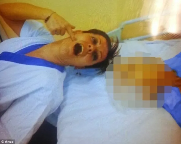 Italian Nurse Accused Of Killing 38 'Annoying' Patients Posing Next To A Corpse 