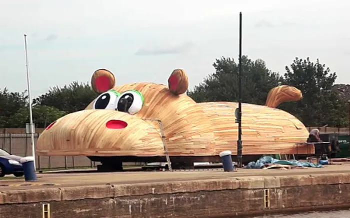 Giant Hippo floats down the Thames 