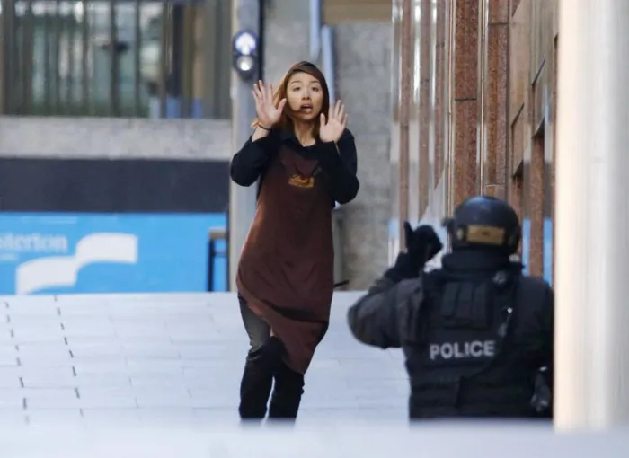 Sydney siege: Hostages held in Lindt cafe